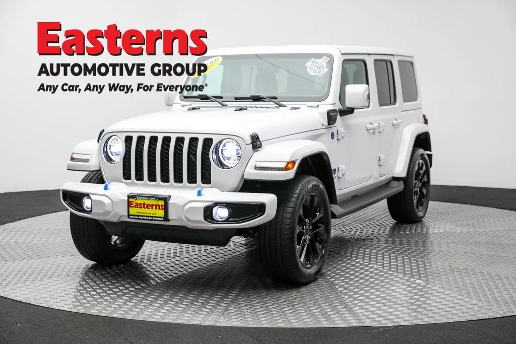 Used 2021 White Jeep Unlimited Sahara High Altitude 4xe image 1