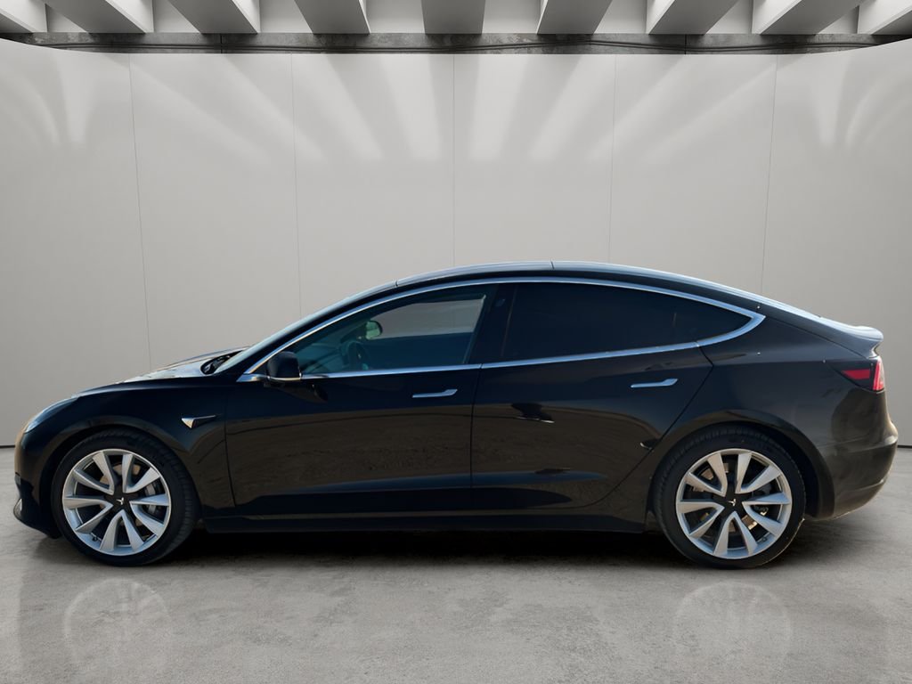 Used 2018 Tesla Model 3 Long Range Dual Motor with VIN 5YJ3E1EBXJF184784 for sale in Sterling, CO