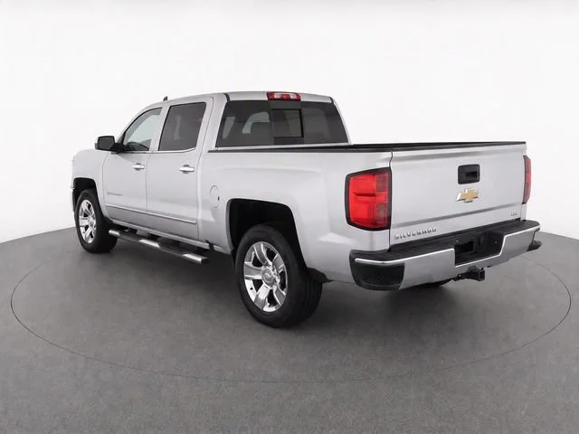 Used 2017 SILVER ICE METALLIC Chevrolet LTZ image 4