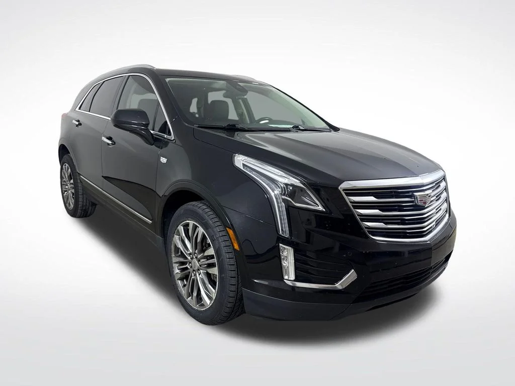 Used 2019 Black Cadillac Premium Luxury image 1