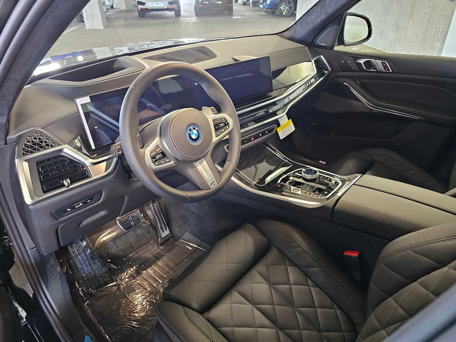 New 2026 Black Sapphire Metallic BMW xDrive50e image 2