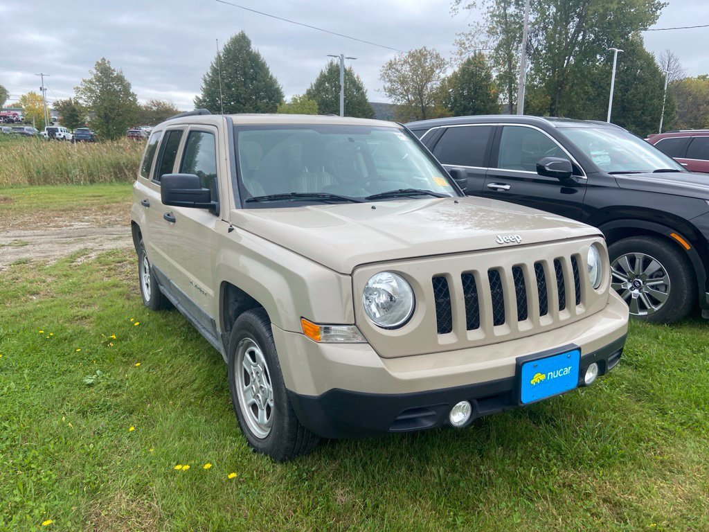 Used 2016 Mojave Sand Clearcoat Jeep Sport image 1
