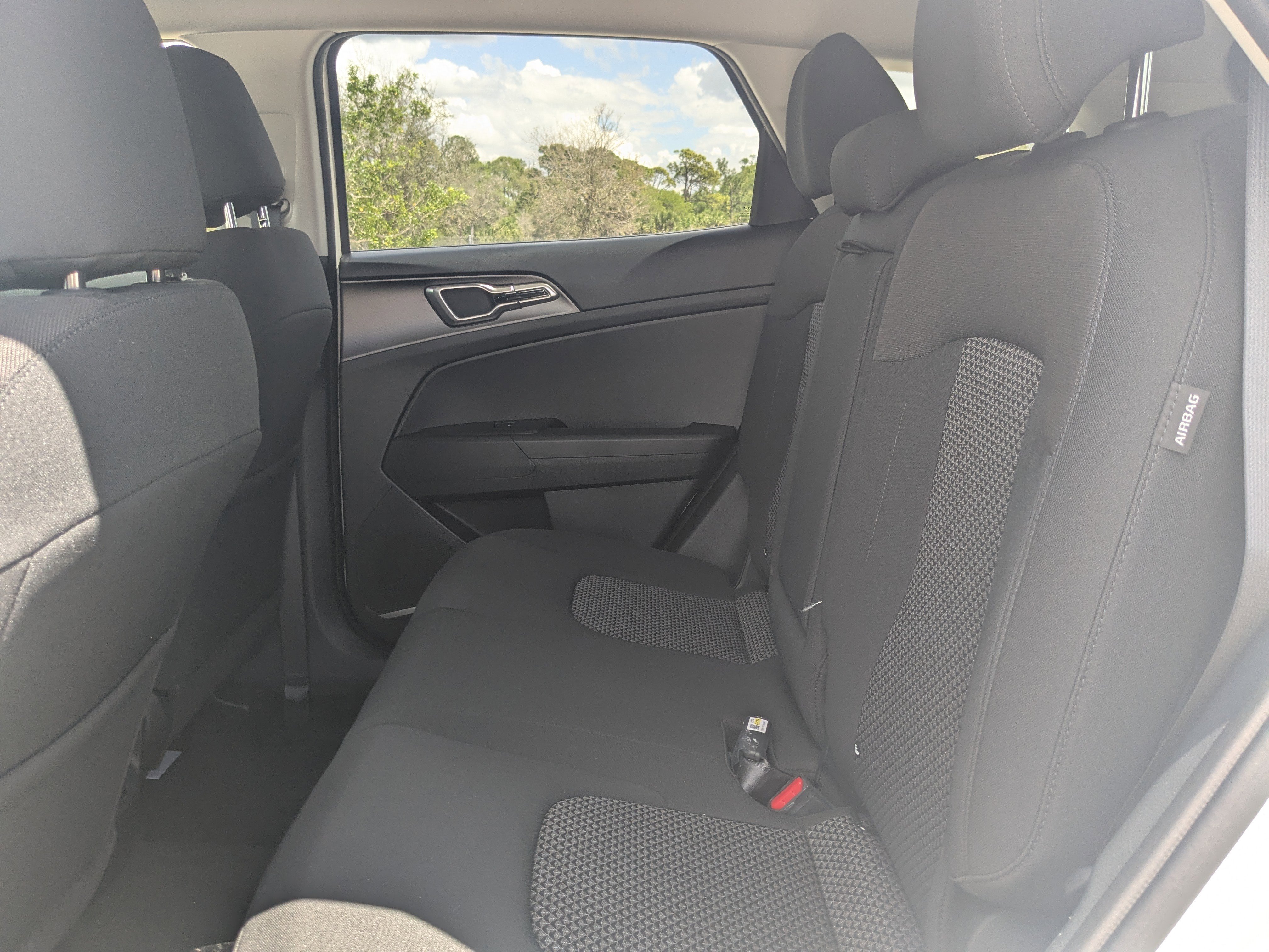 New 2026 Snow White Pearl Kia LX image 16