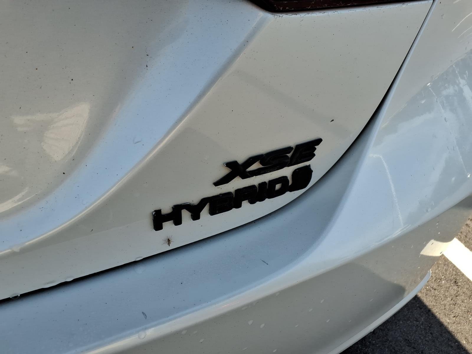 Used 2021 Wind Chill Pearl/Midnight Black Metallic Toyota Hybrid XSE image 7