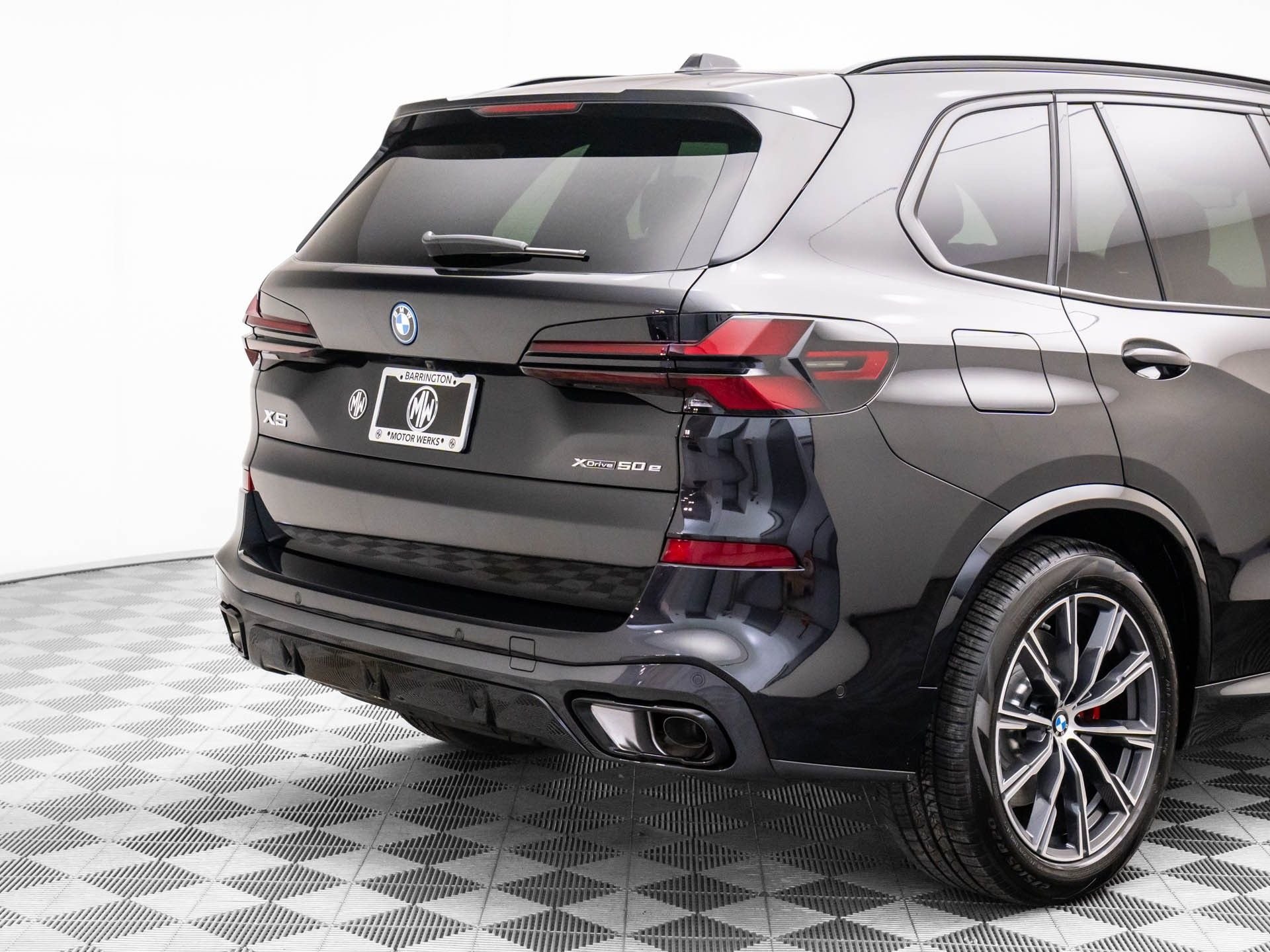 New 2026 Black Sapphire Metallic BMW xDrive50e image 36