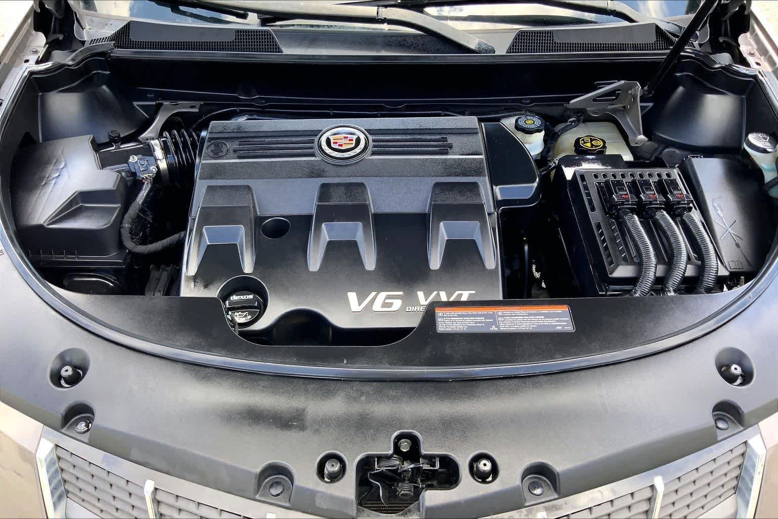 Used 2012 Mocha Steel Metallic Cadillac Luxury Collection image 31