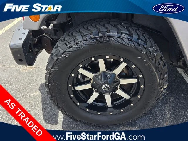 Used 2016 Silver Jeep Unlimited Sahara image 16