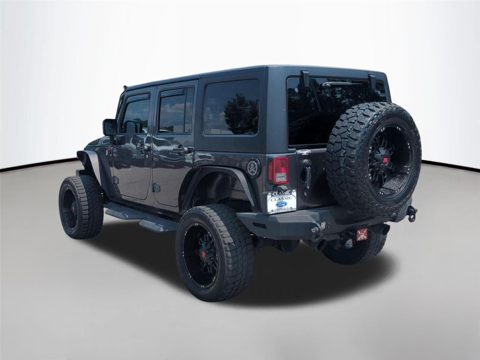 Used 2017 Granite Crystal Metallic Clearcoat Jeep Rubicon image 3