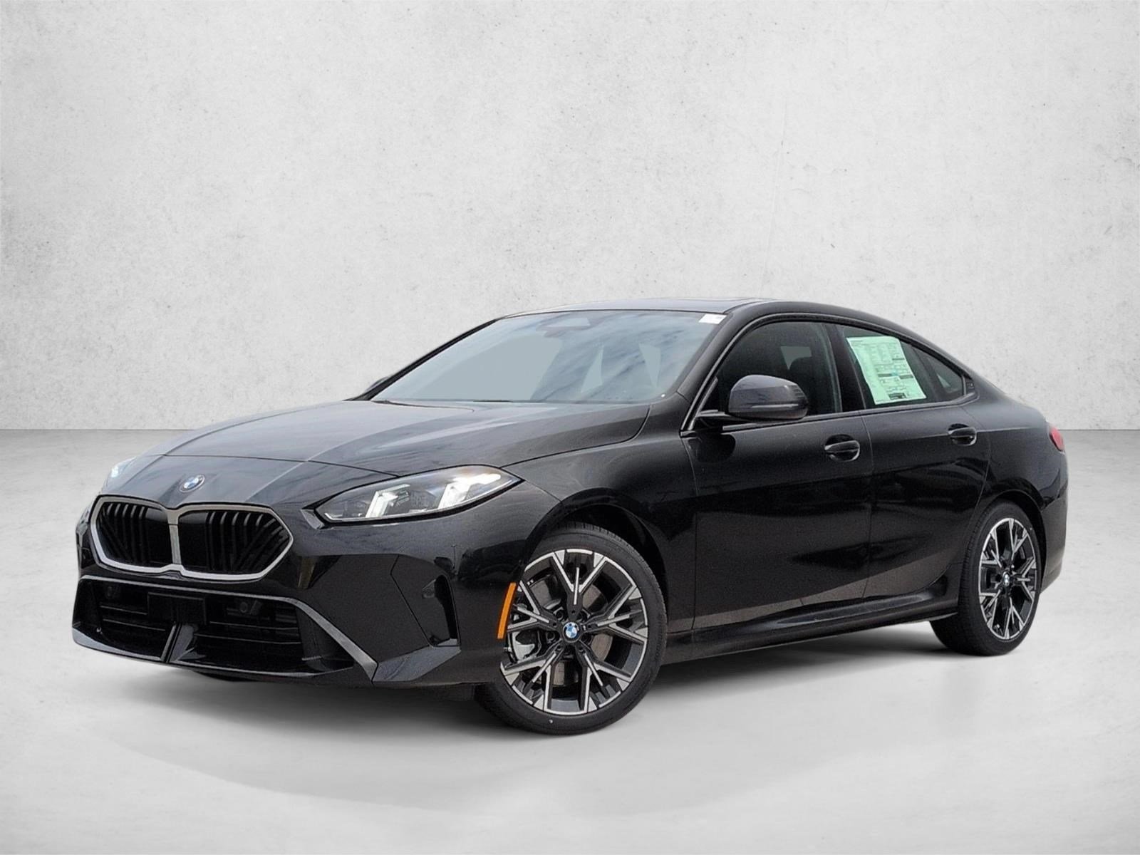 Used 2026 Black Sapphire Metallic BMW 228 xDrive image 1