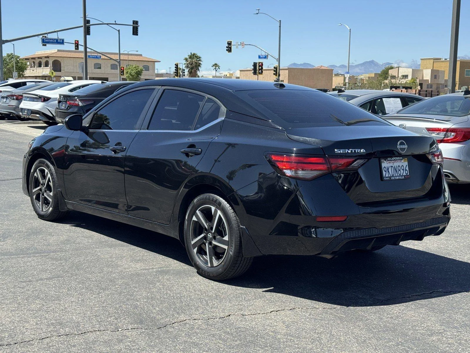 Used 2024 Super Black Nissan SV image 4