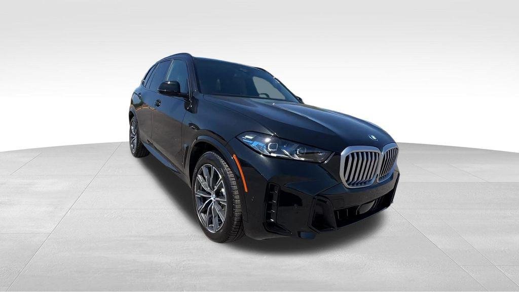 New 2026 Black Sapphire Metallic BMW xDrive50e image 14