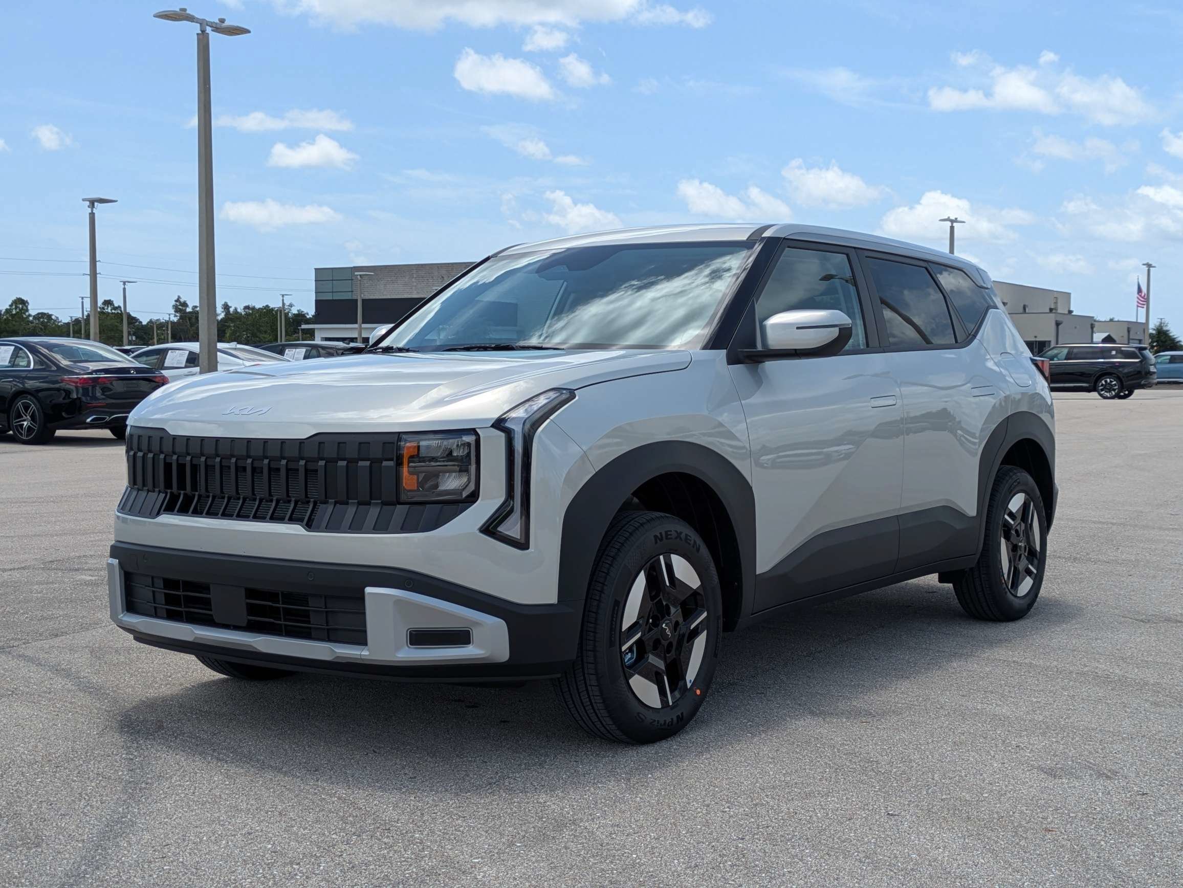 New 2027 Ivory Silver Kia LX image 9