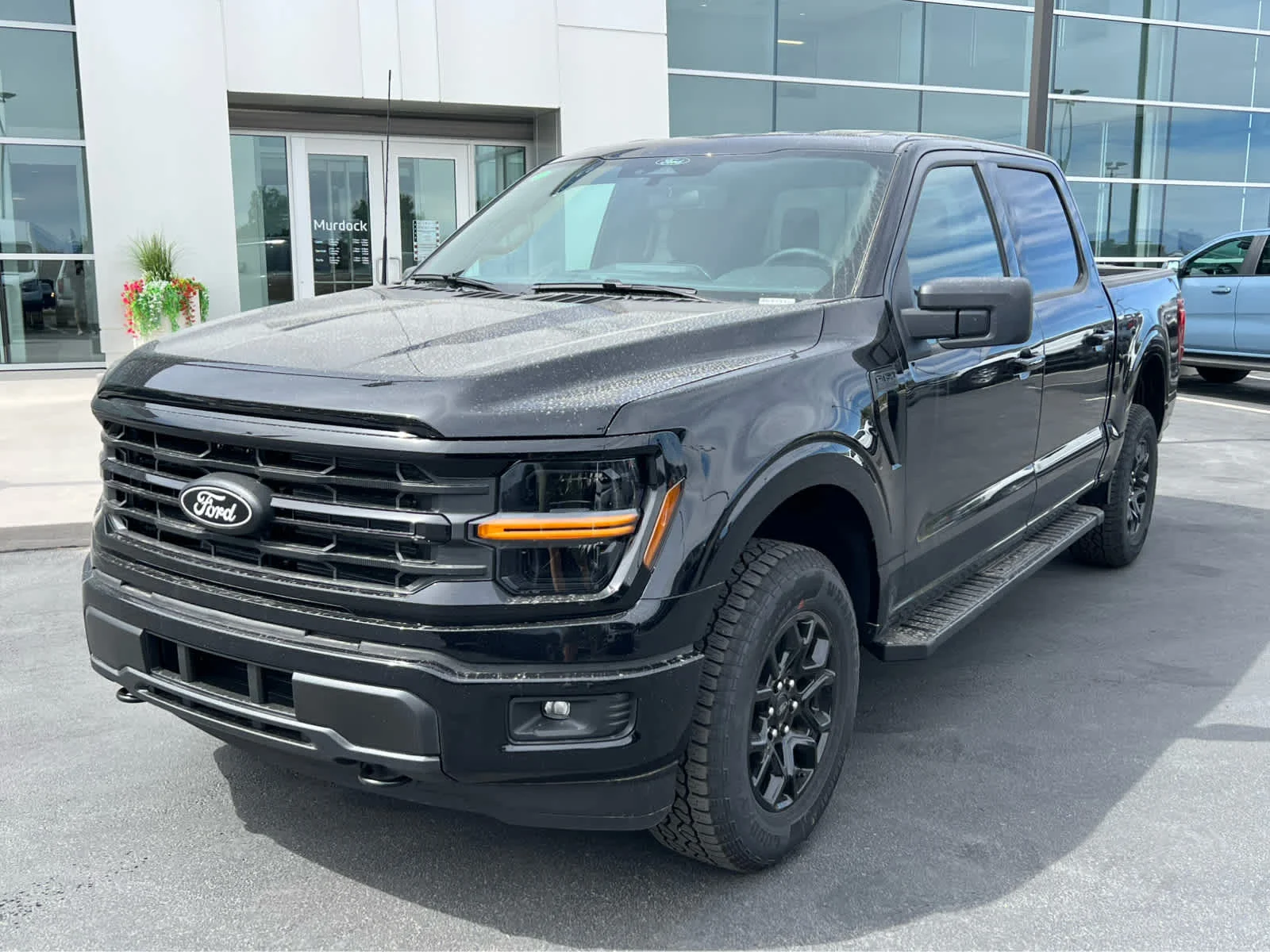 New 2026 Agate Black Metallic Ford XLT image 2
