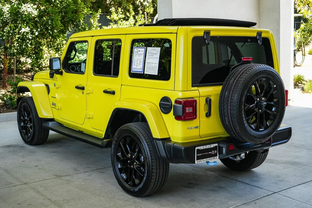 Used 2023 Yellow Jeep Sahara 4xe image 4