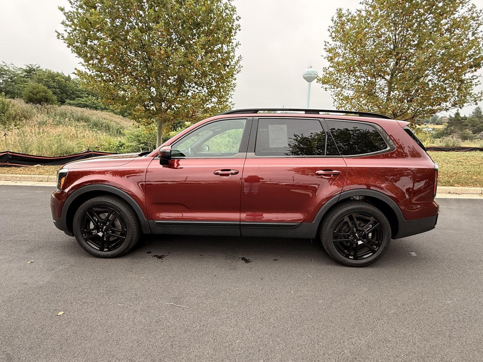 Used 2024 Dawning Red Kia EX X-Line image 8