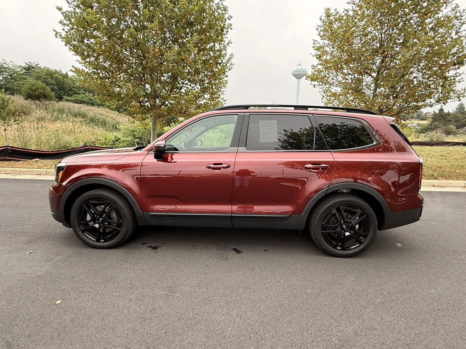 Used 2024 Dawning Red Kia EX X-Line image 8