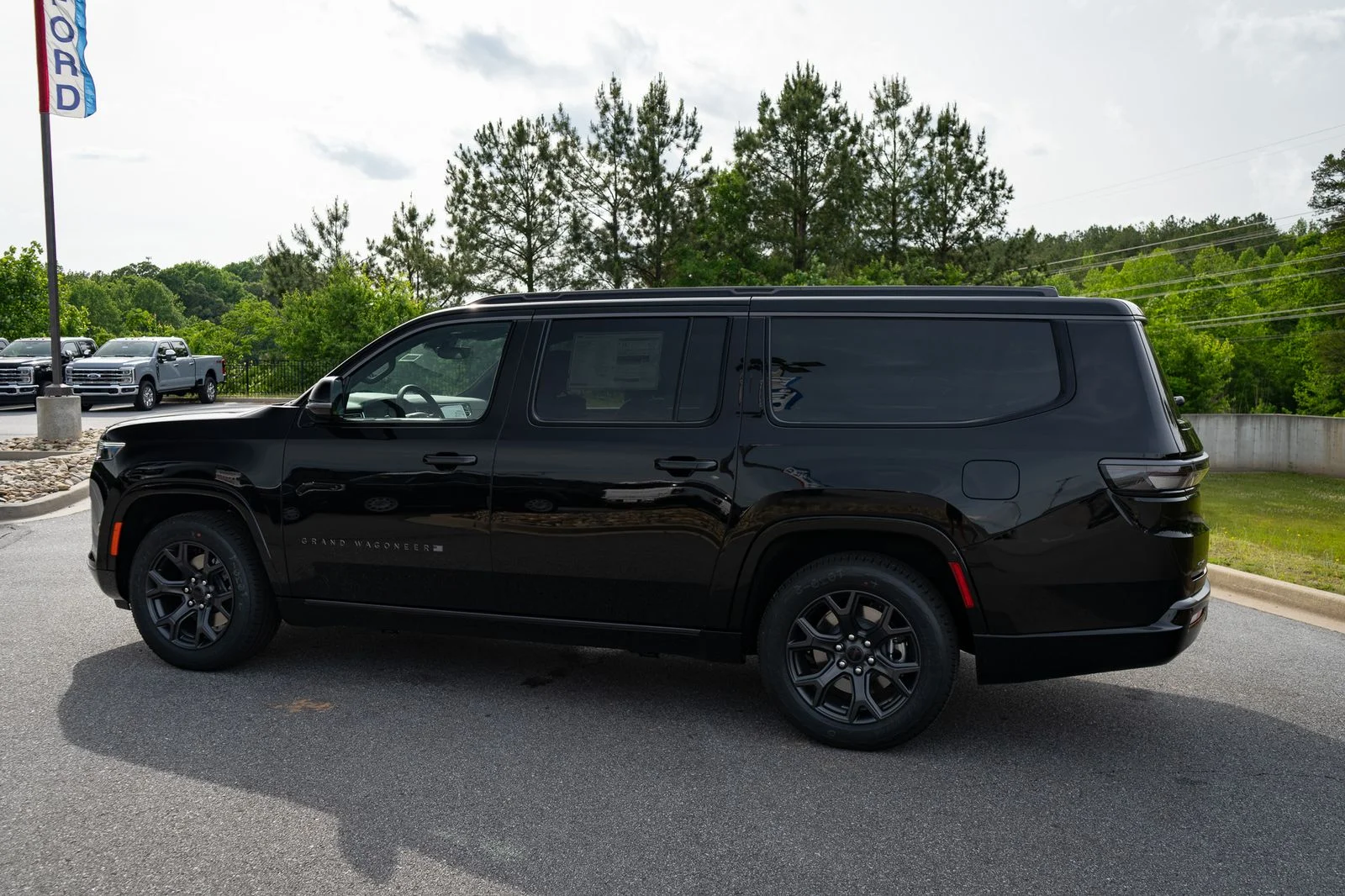 New 2026 Black Jeep Limited Altitude image 7