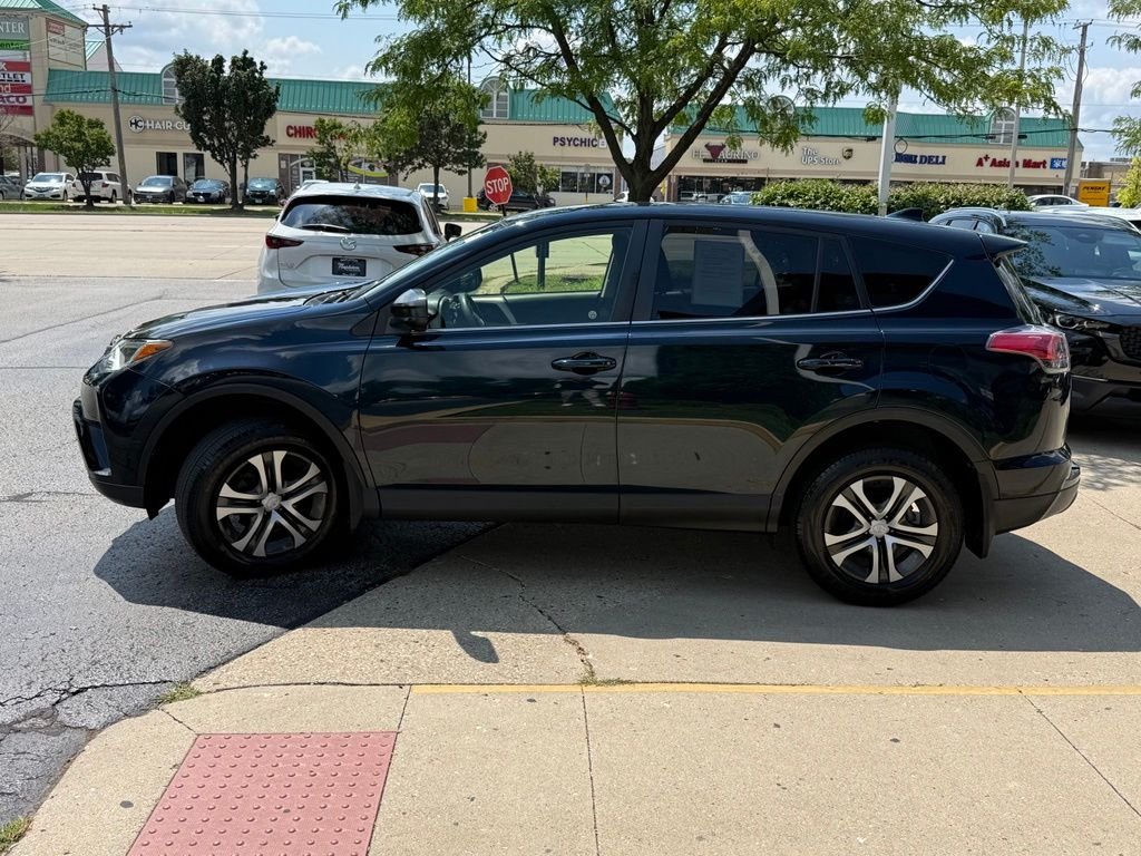 Used 2018 Blue Toyota LE image 4