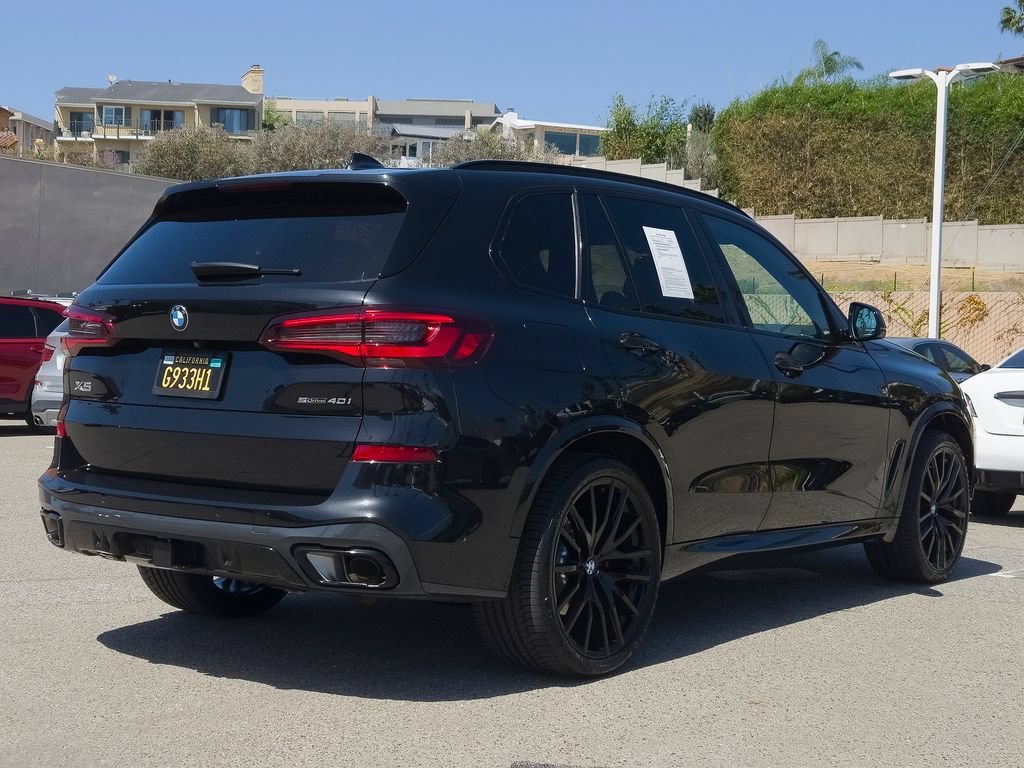 Used 2023 Black Sapphire Metallic BMW sDrive40i image 27