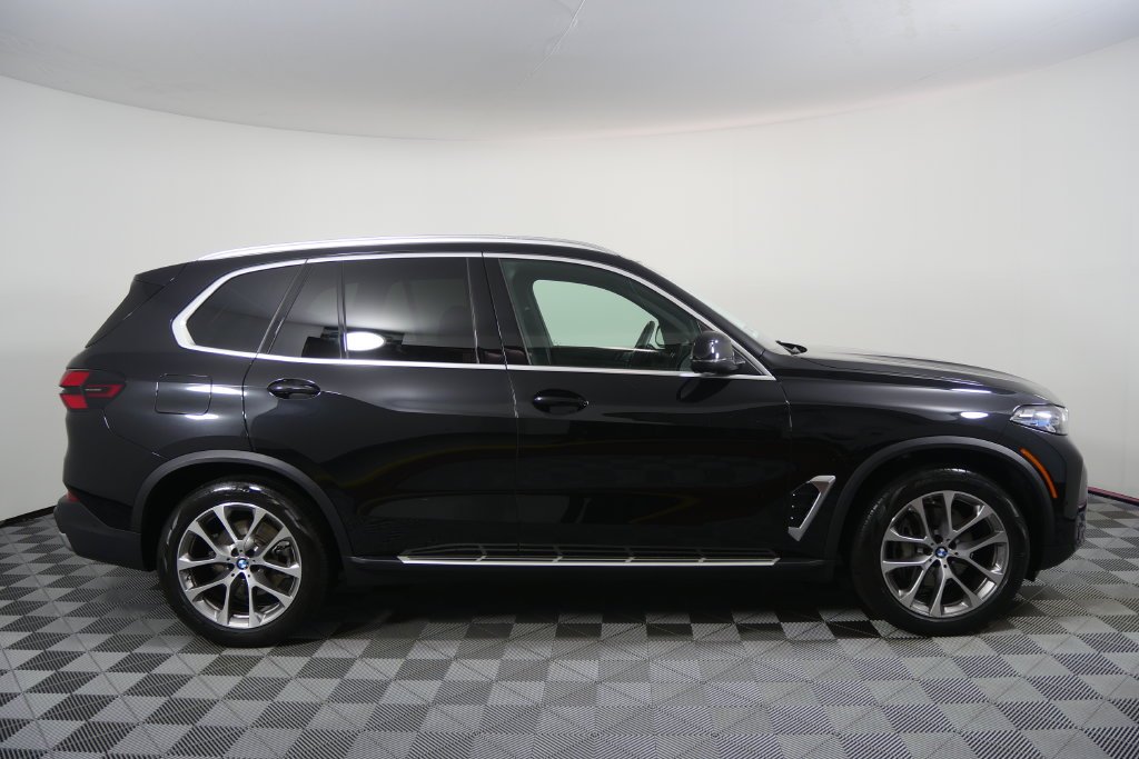 Certified Used 2024 Black Sapphire Metallic BMW sDrive40i image 3