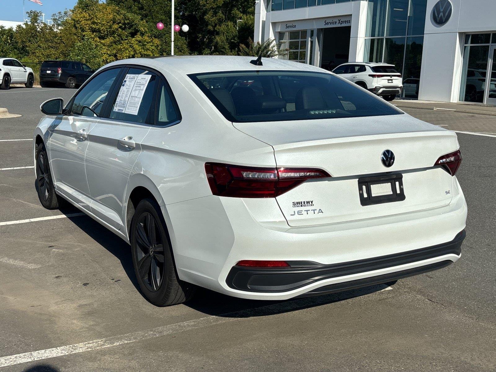 Certified Used 2023 Opal White Pearl Volkswagen SE image 3