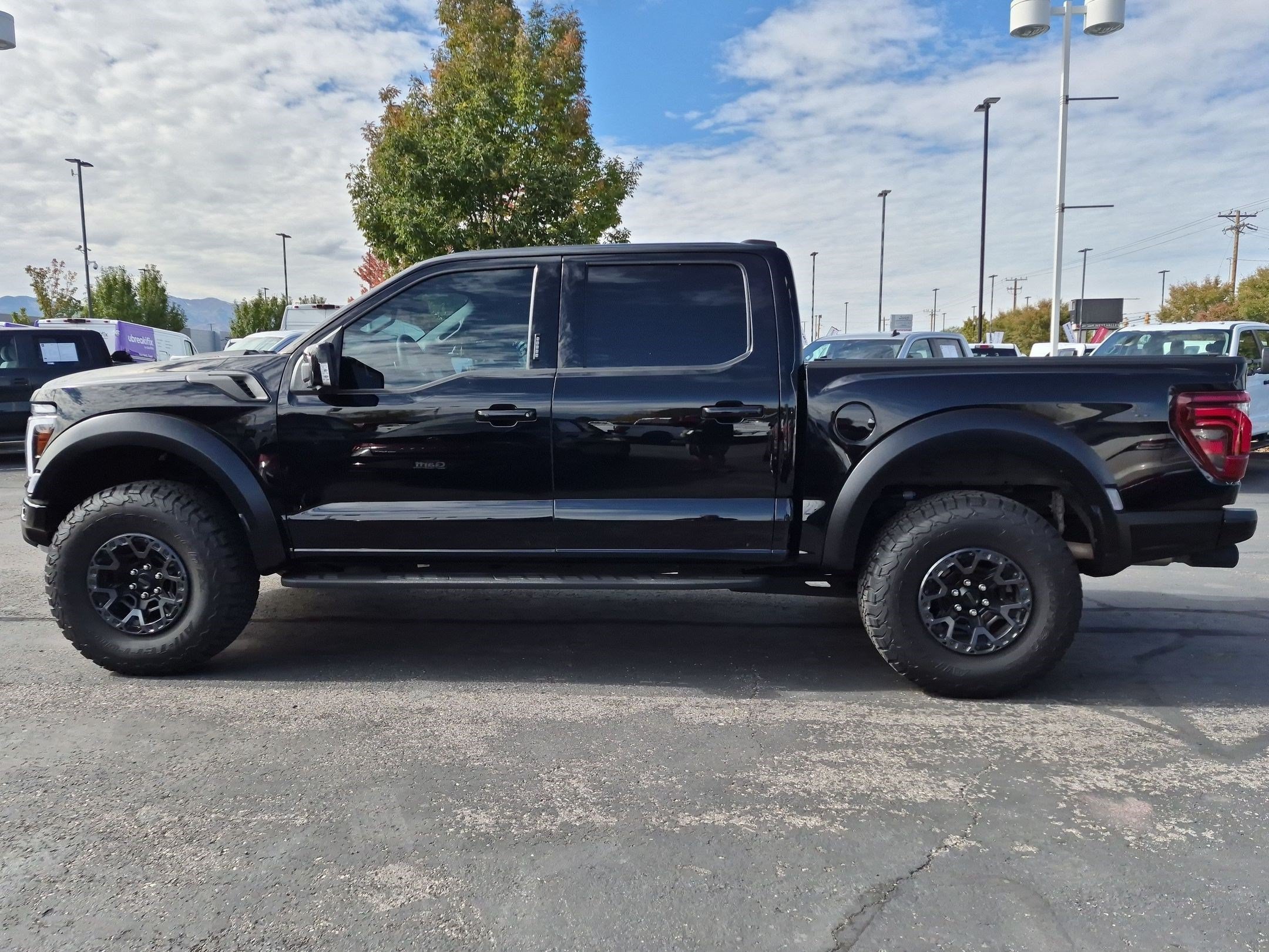 Used 2026 Black Metallic Ford Raptor image 7