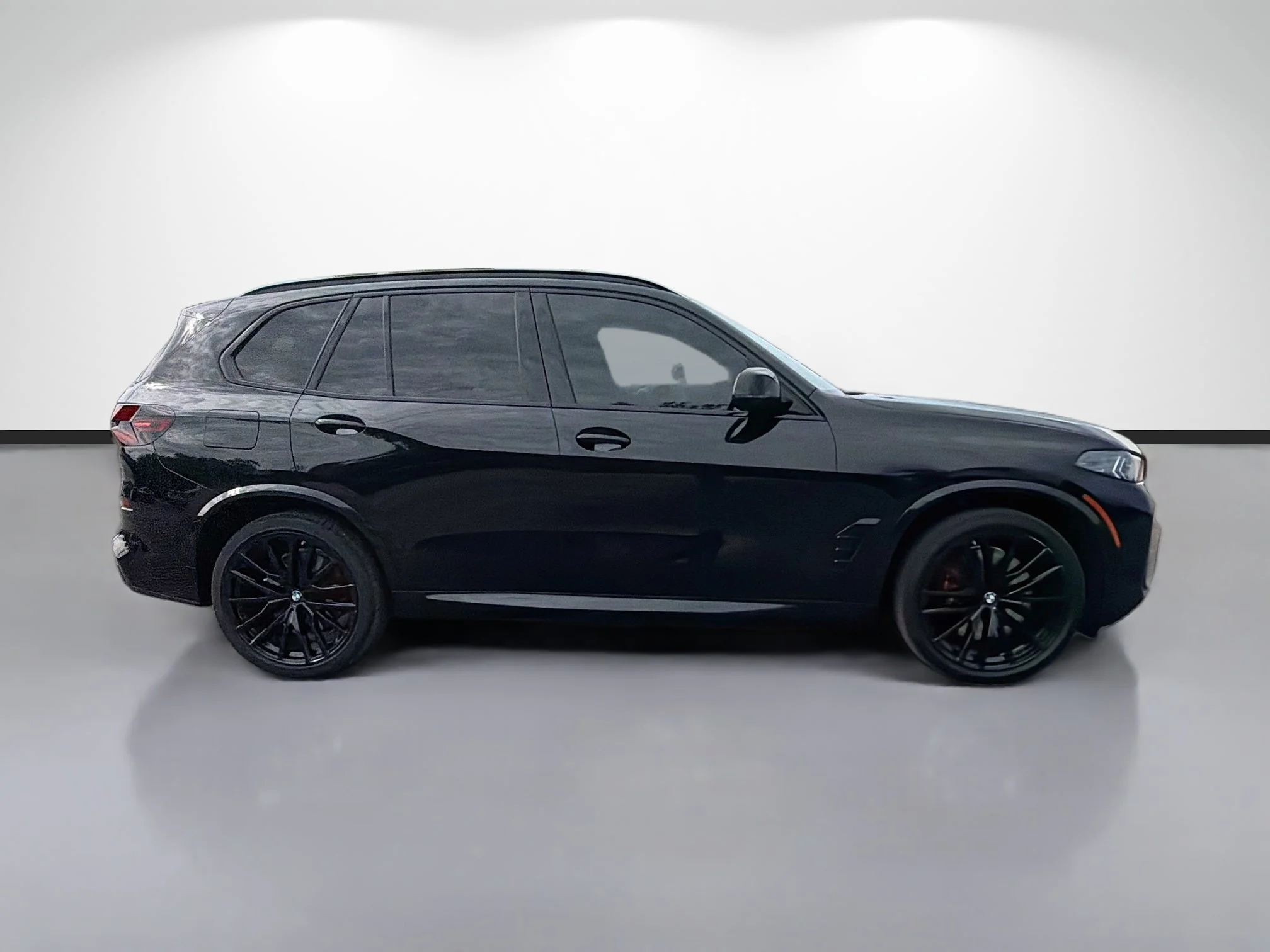 Used 2025 Black Sapphire Metallic BMW M60i image 2
