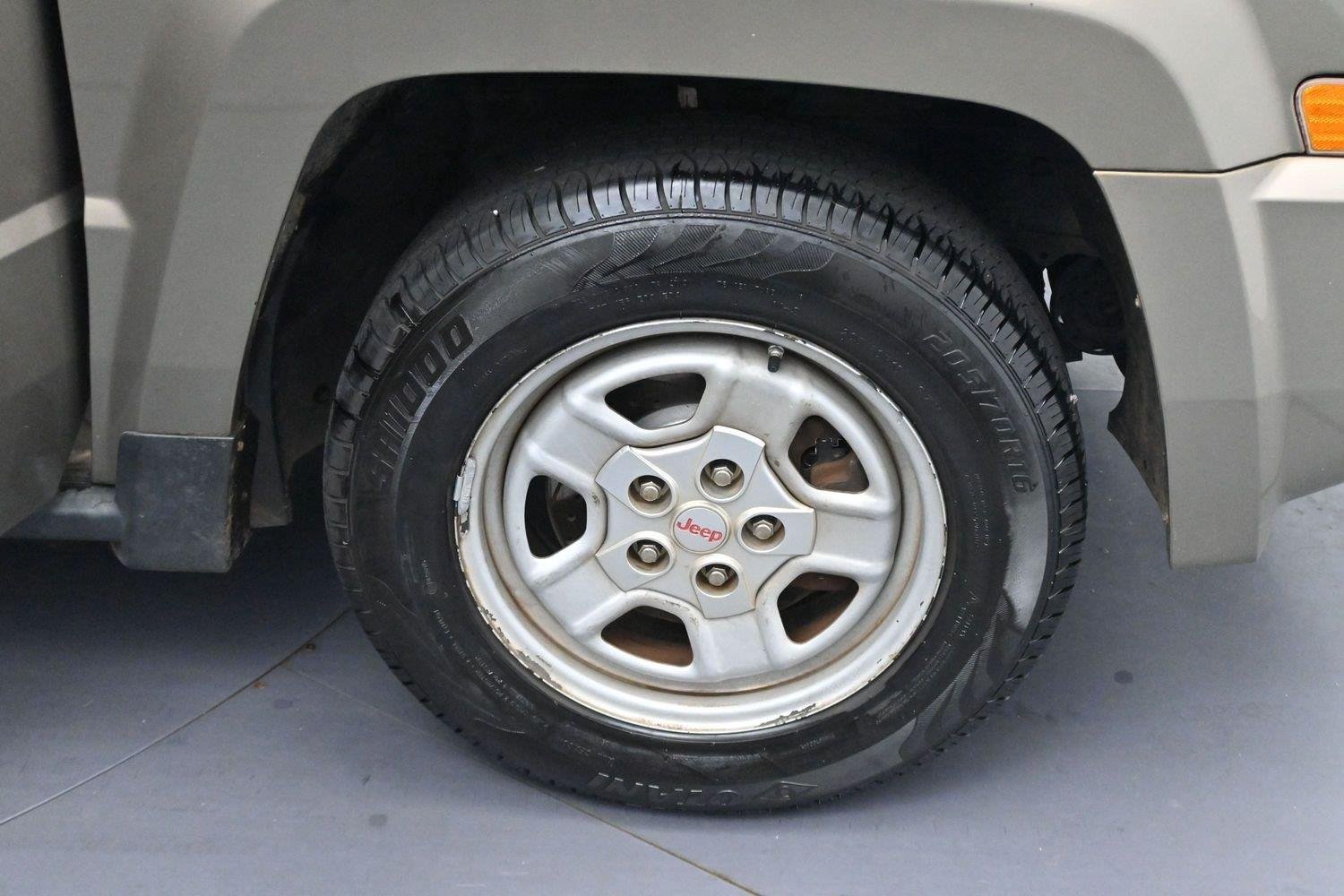 Used 2008 Light Khaki Metallic Jeep Sport image 25