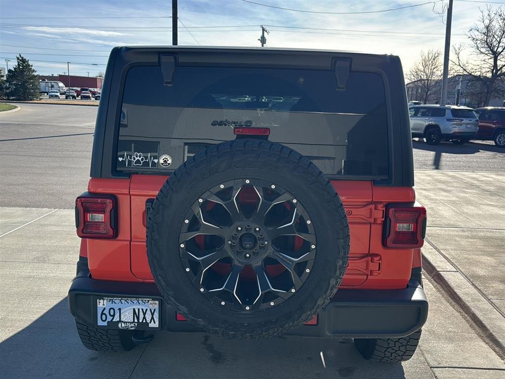 Used 2023 Orange Jeep Unlimited Sahara image 4