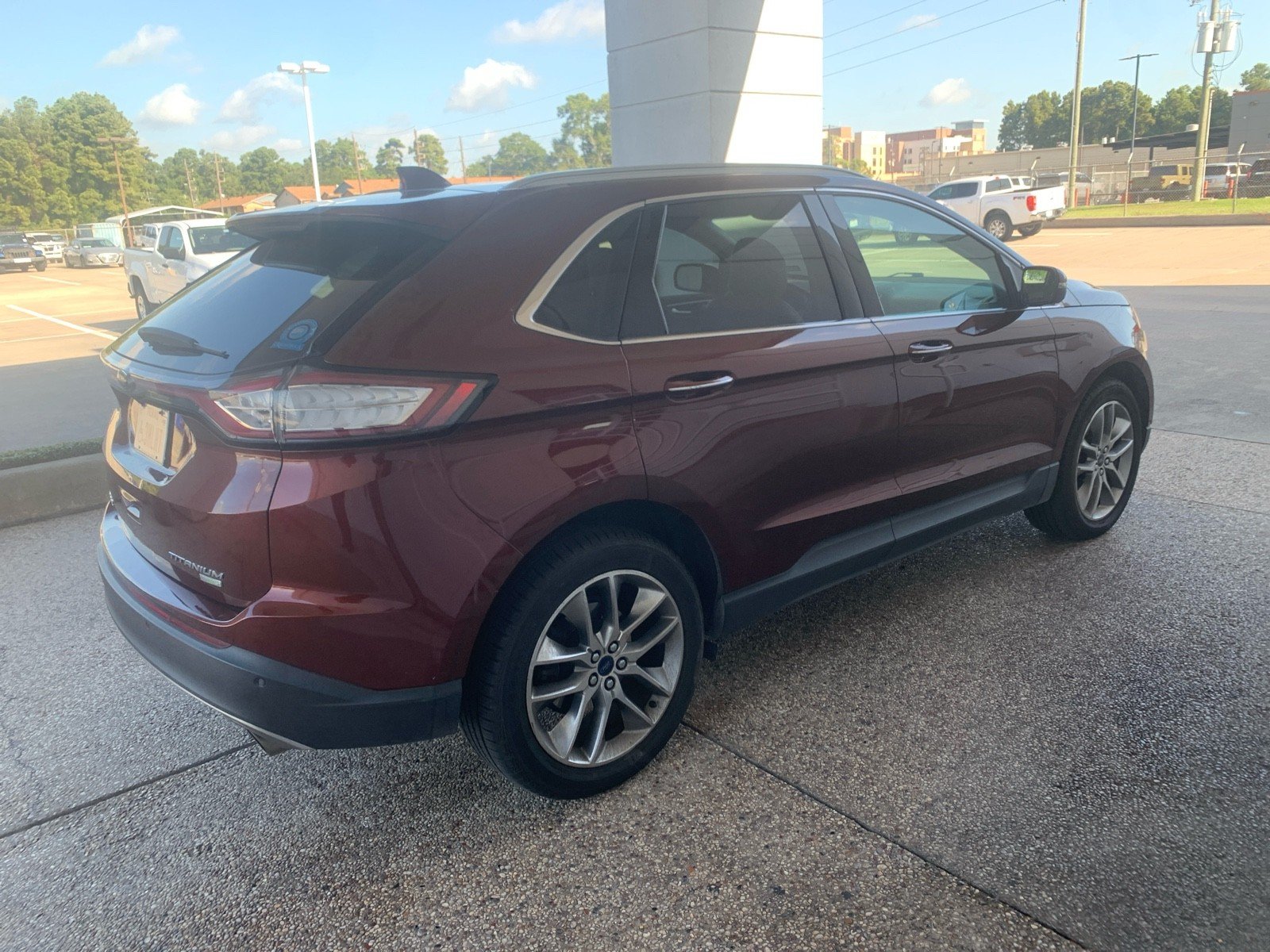 Used 2015 Bronze Fire Metallic Tinted Clearcoat Ford Titanium image 1