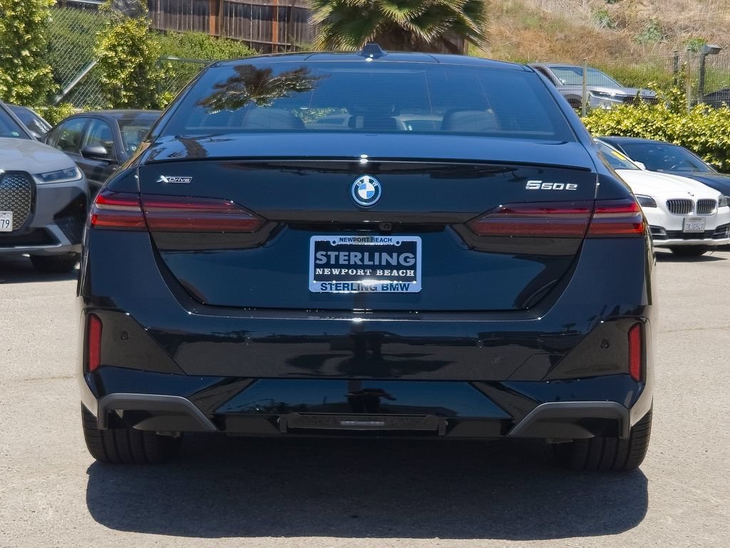 New 2027 Black Sapphire Metallic BMW 550e xDrive image 19