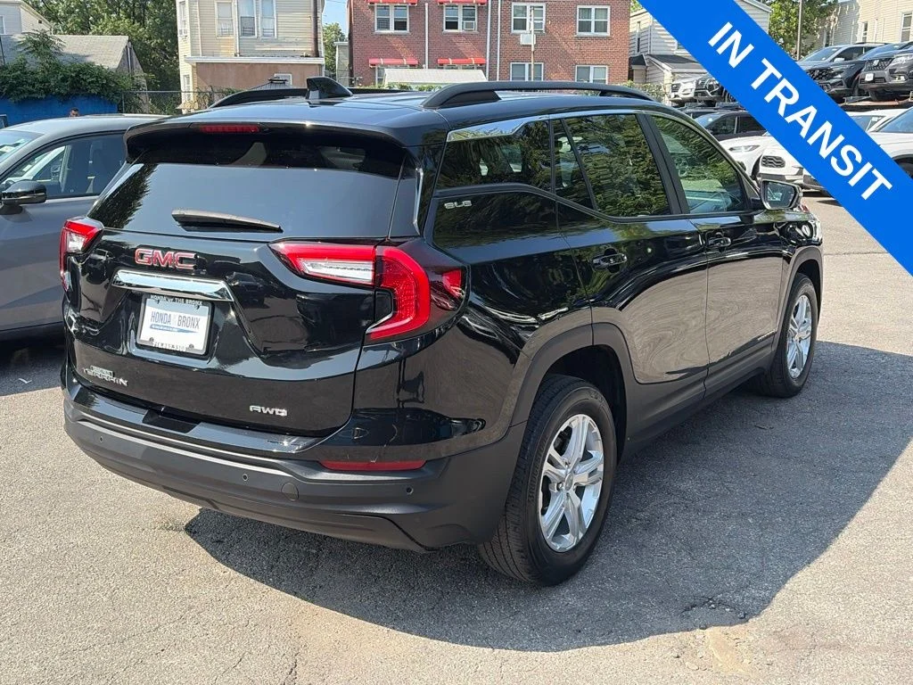 Used 2024 Ebony Twilight Metallic GMC SLE image 11