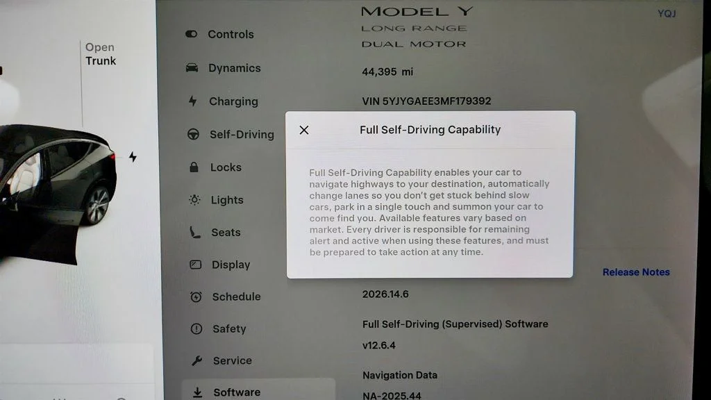 Used 2021 Solid Black Tesla Long Range AWD w/ White/Black 7-Seat Interior image 16