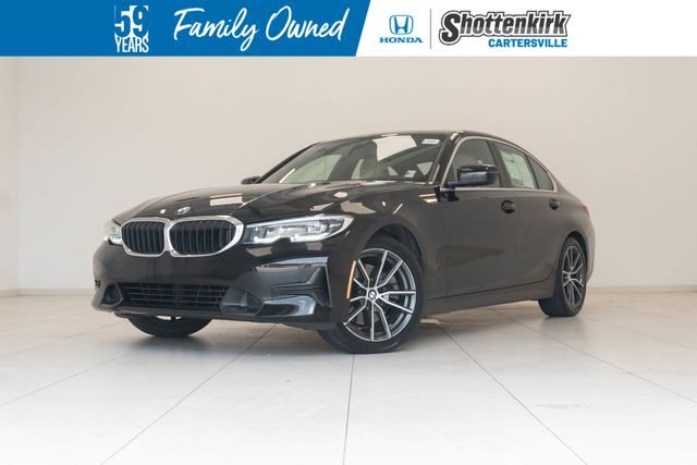 Used 2021 Black BMW 330i image 1