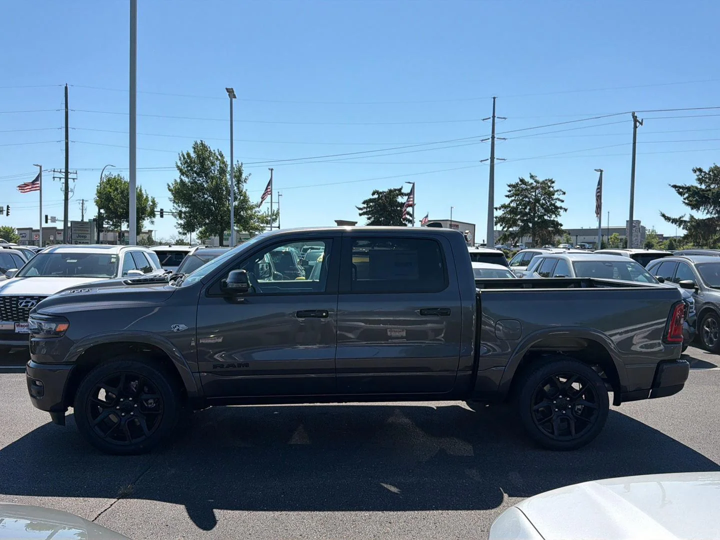 New 2026 Granite Crystal Metallic Clear-Coat Exterior Paint RAM Laramie image 4
