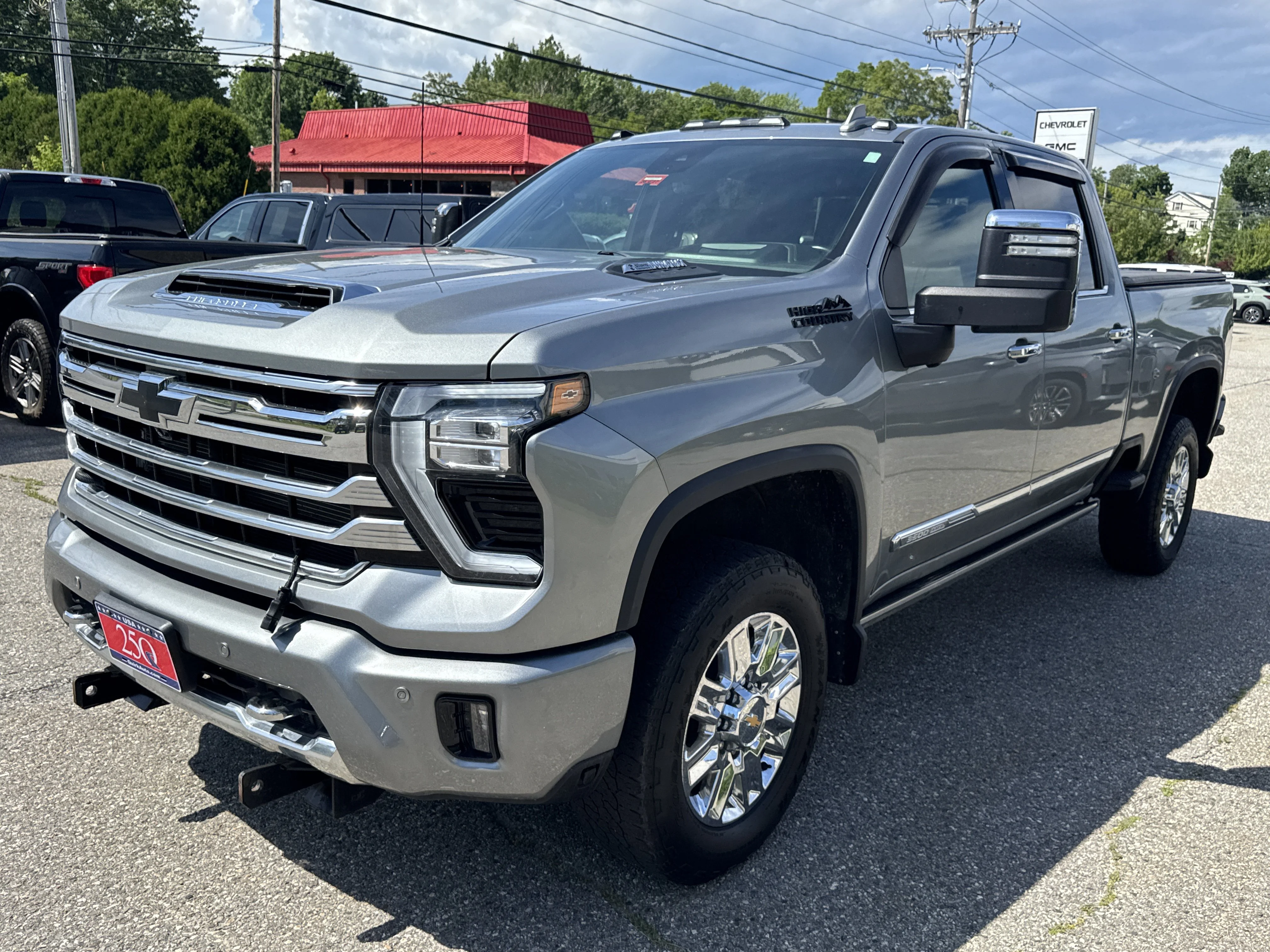 Used 2024 Sterling Gray Metallic Chevrolet High Country image 1