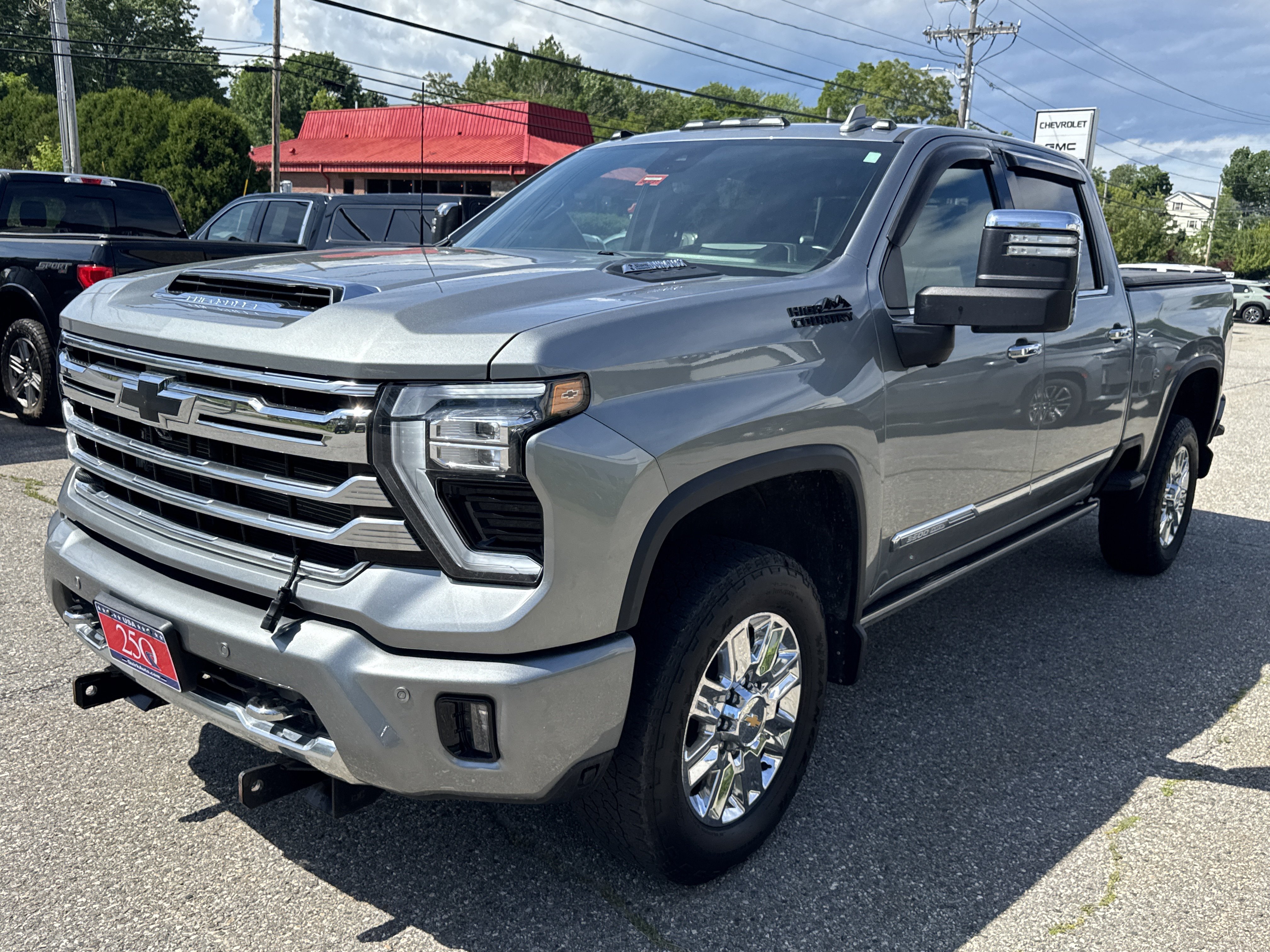 Used 2024 Sterling Gray Metallic Chevrolet High Country image 1