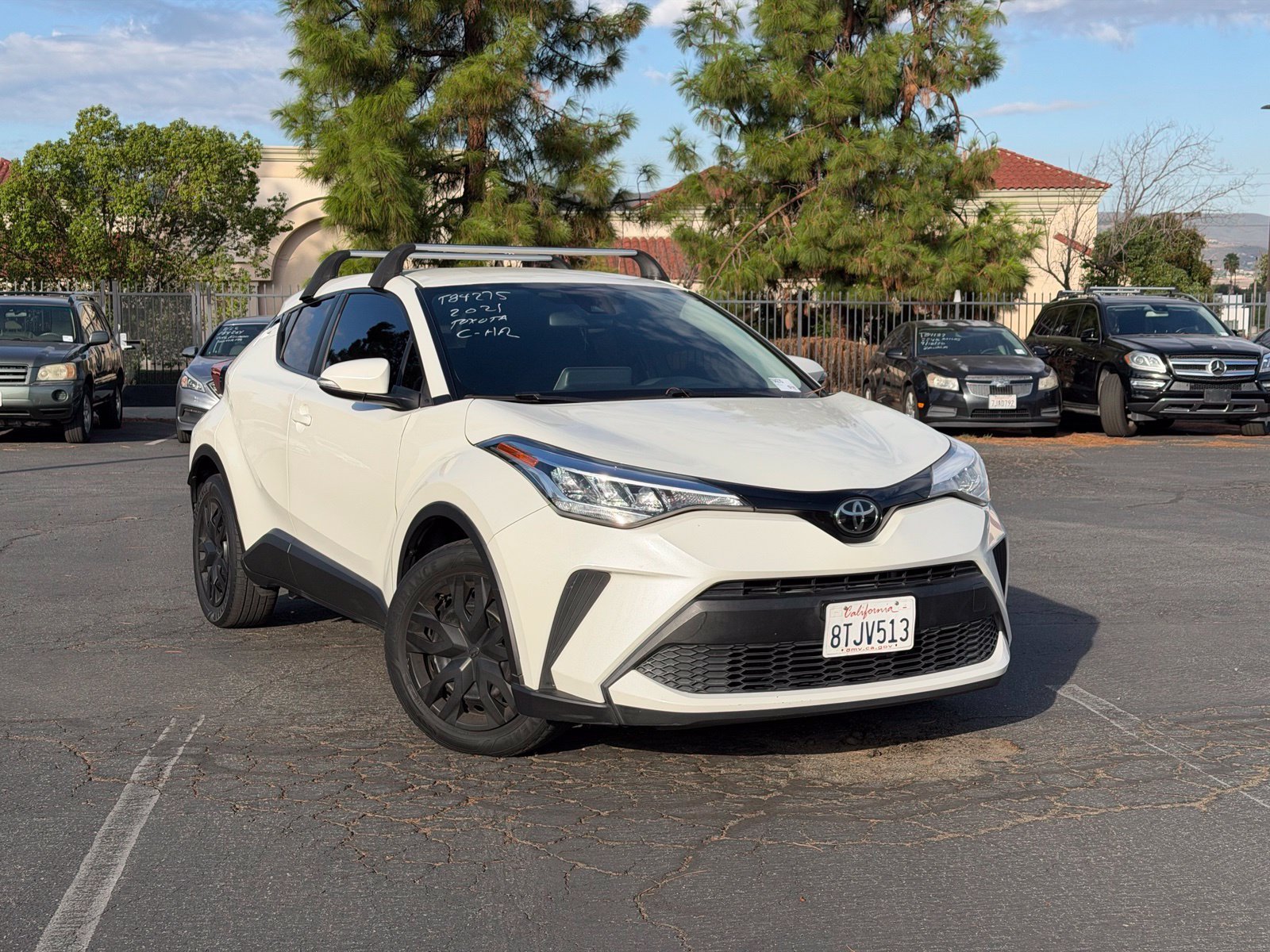 Used 2021 Blizzard Pearl Toyota LE image 1