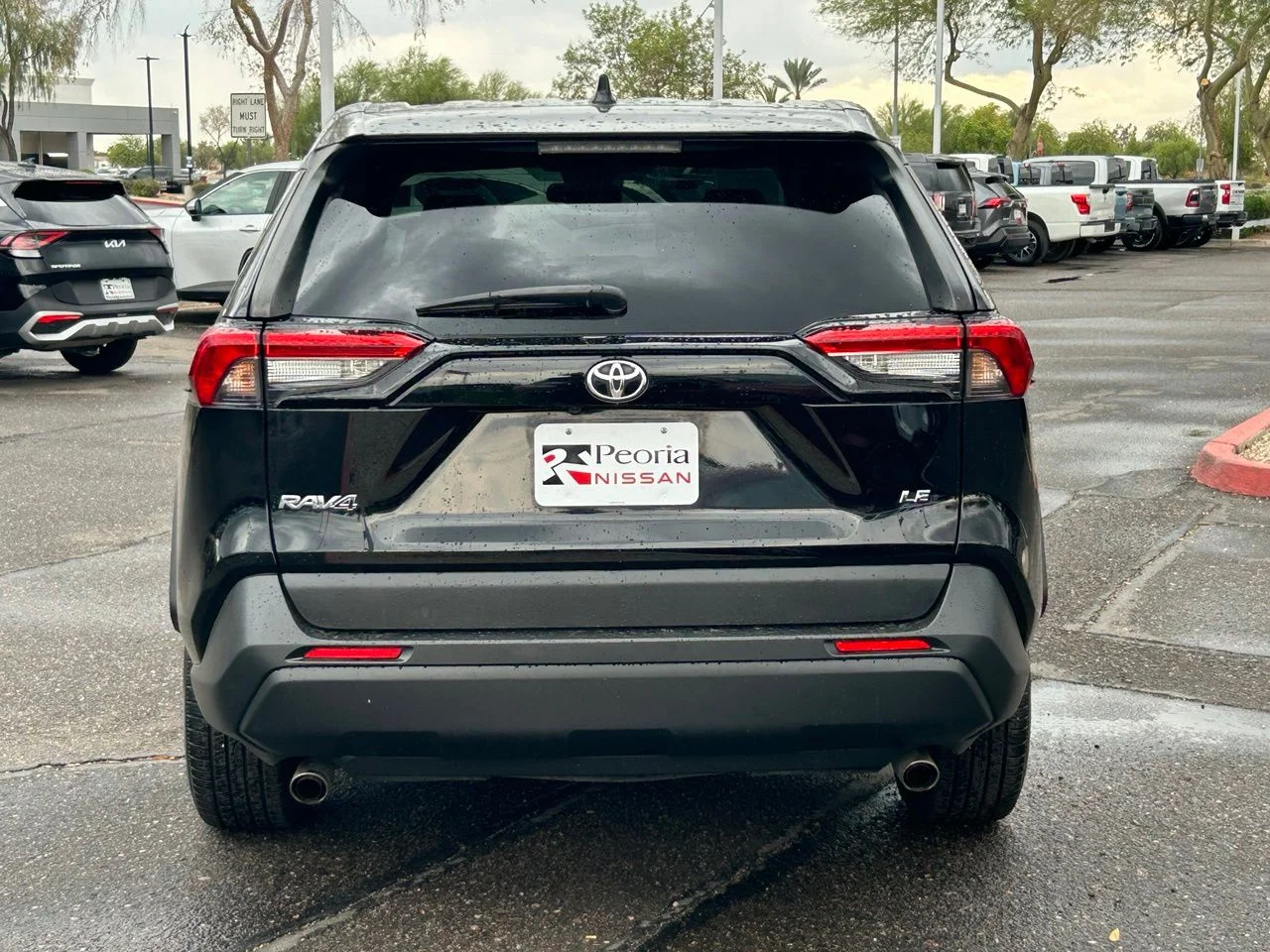Used 2022 Midnight Black Metallic Toyota LE image 4