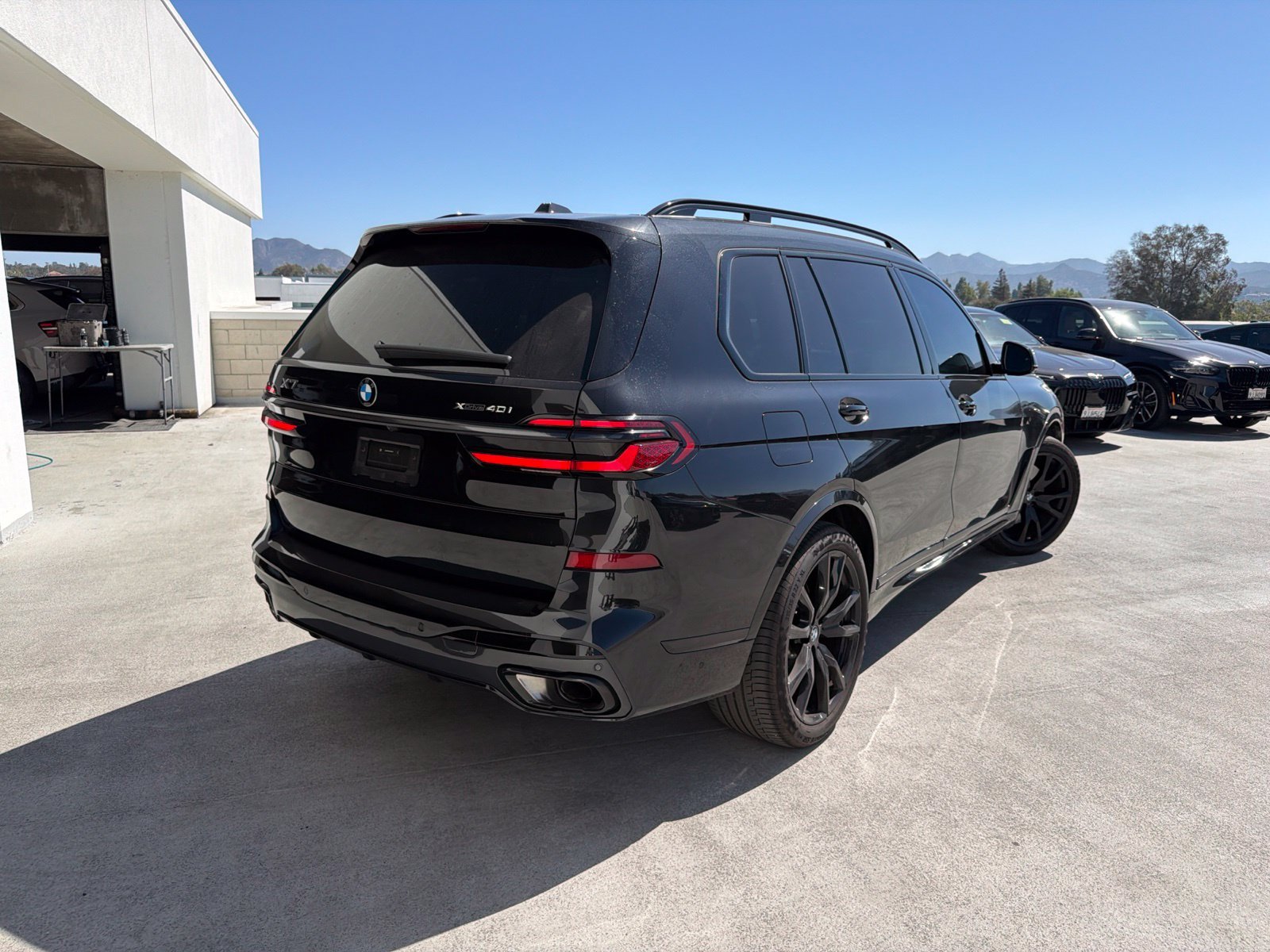 Certified Used 2026 Black Sapphire Metallic BMW xDrive40i image 4