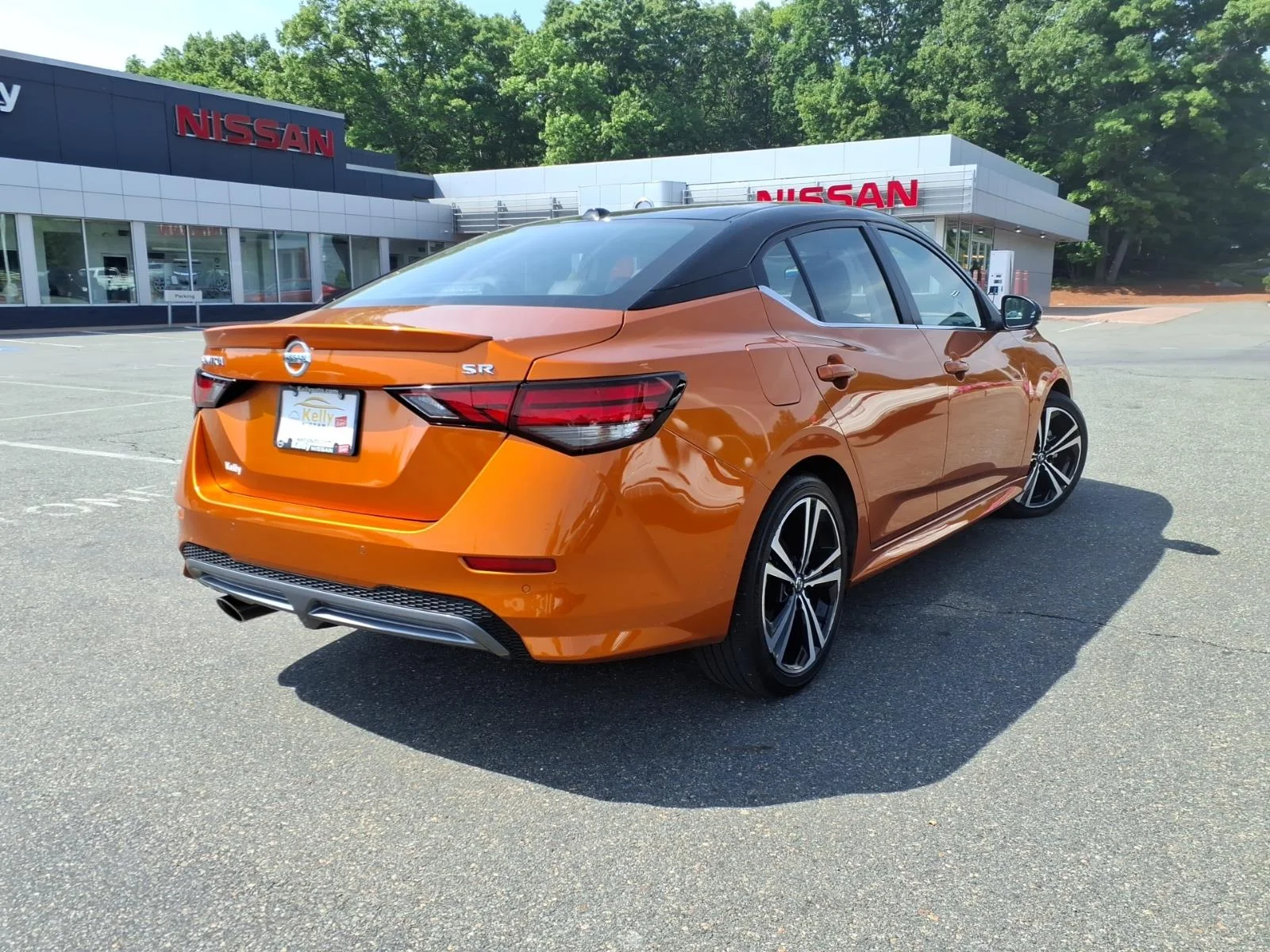Certified Used 2023 Monarch Orange Metallic/Super Black Nissan SR image 5