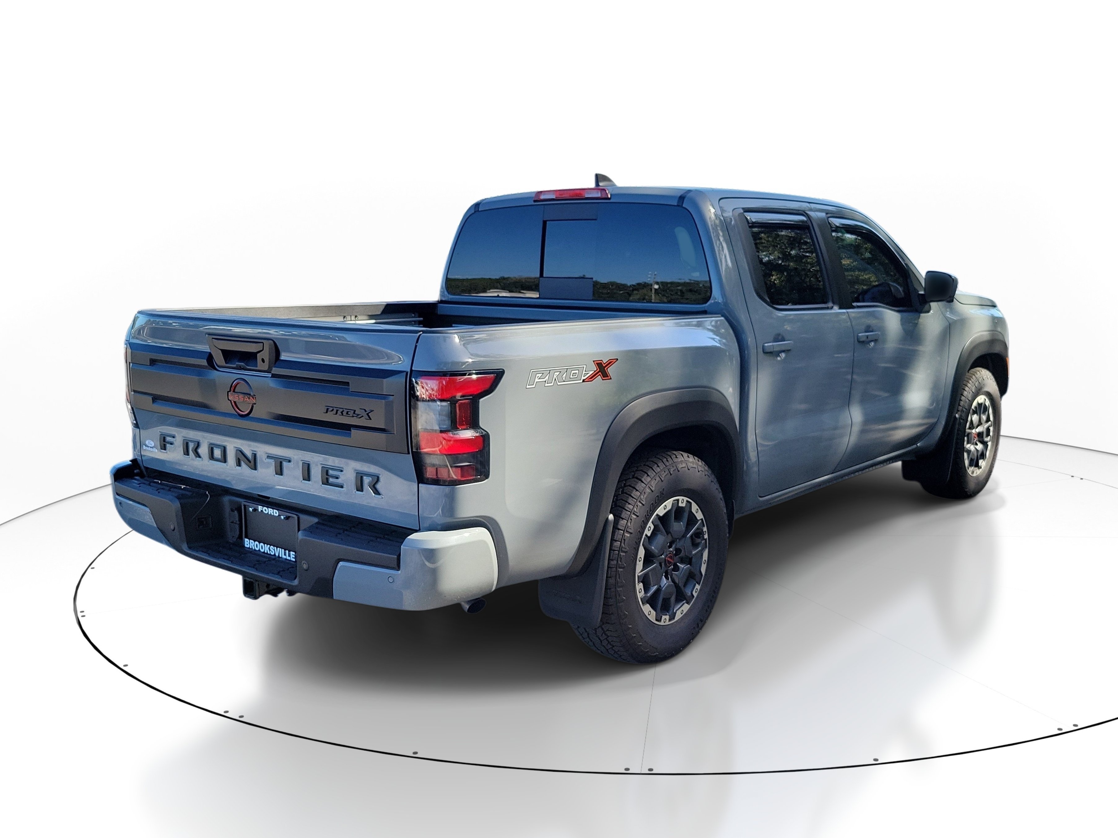 Used 2025 Boulder Gray Pearl Nissan PRO-X image 1