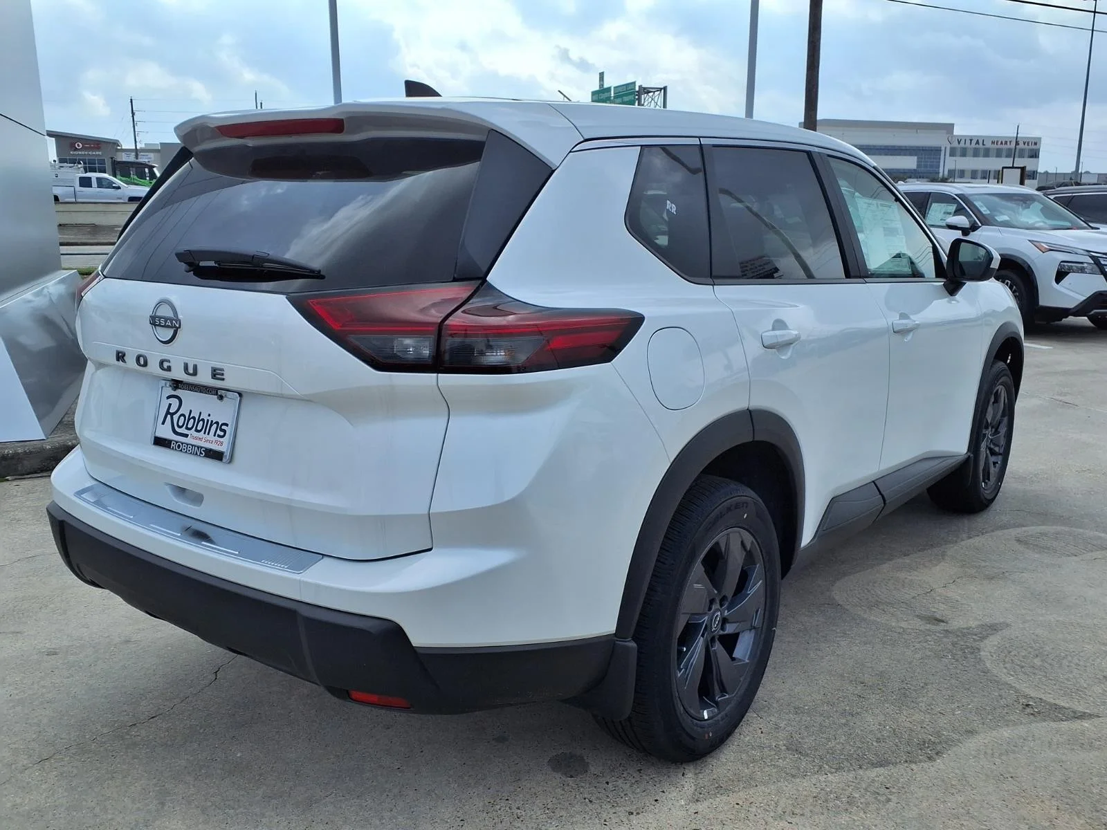 2026 Nissan Rogue SV White at Robbins Nissan