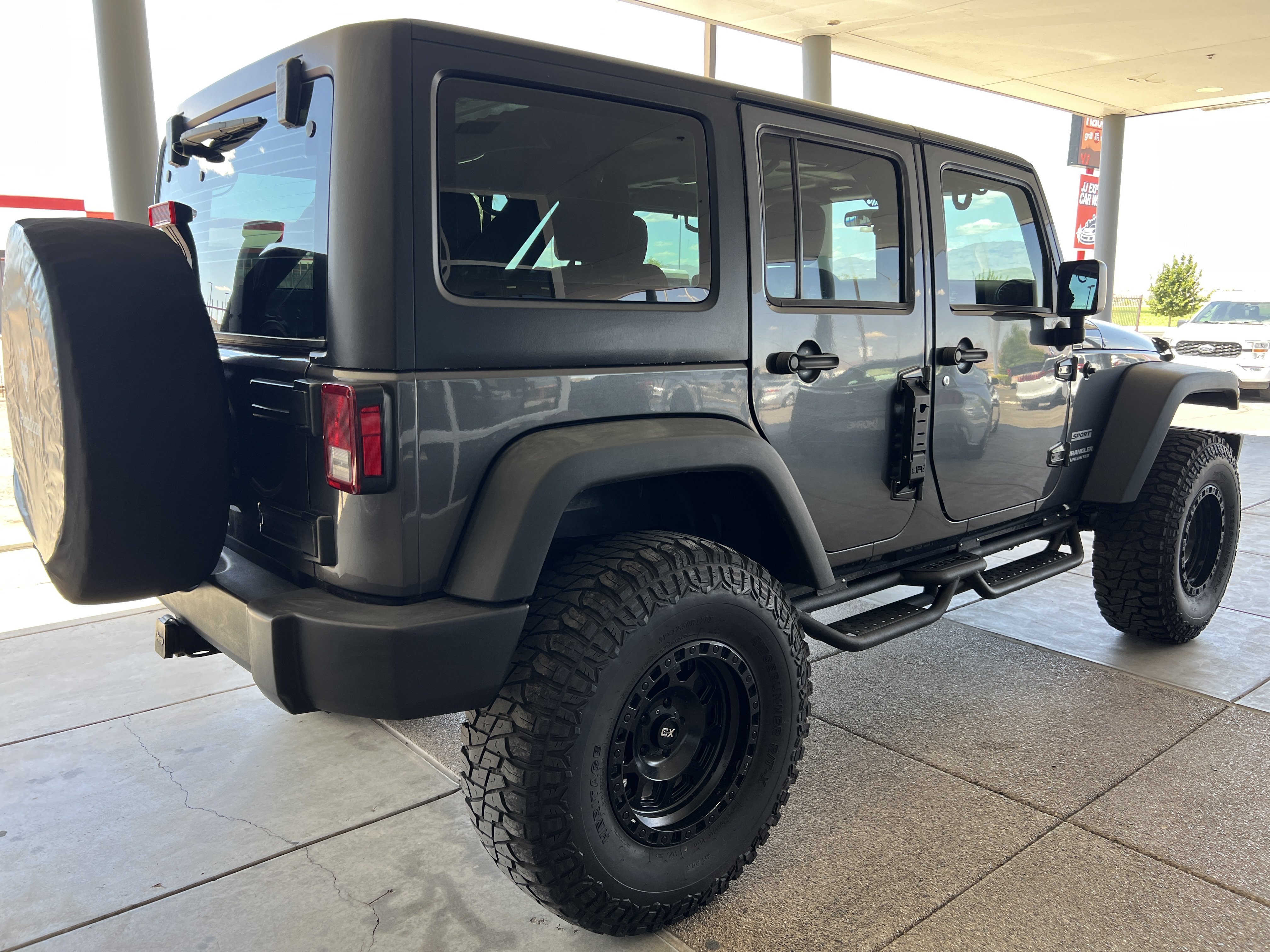 Used 2017 Gray Jeep Sport image 4