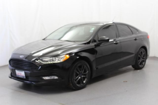 Used 2018 Shadow Black Ford SE image 4