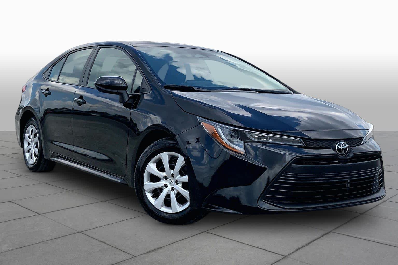 Used 2024 Midnight Black Metallic Toyota LE image 3