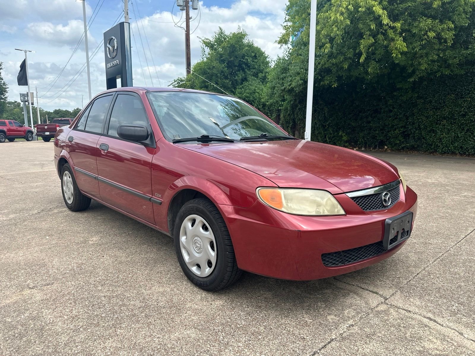 Used 2001 Mazda Protege DX with VIN JM1BJ222710438581 for sale in Hurst, TX