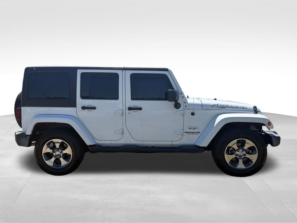 Used 2016 White Jeep Unlimited Sahara image 6