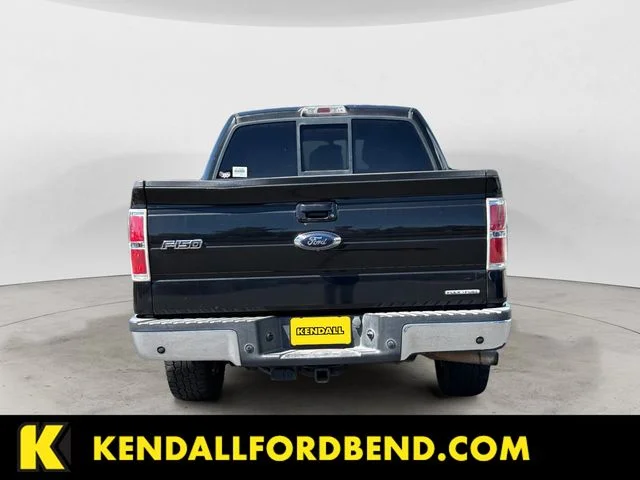 Used 2011 Tuxedo Black Metallic Ford Lariat image 6