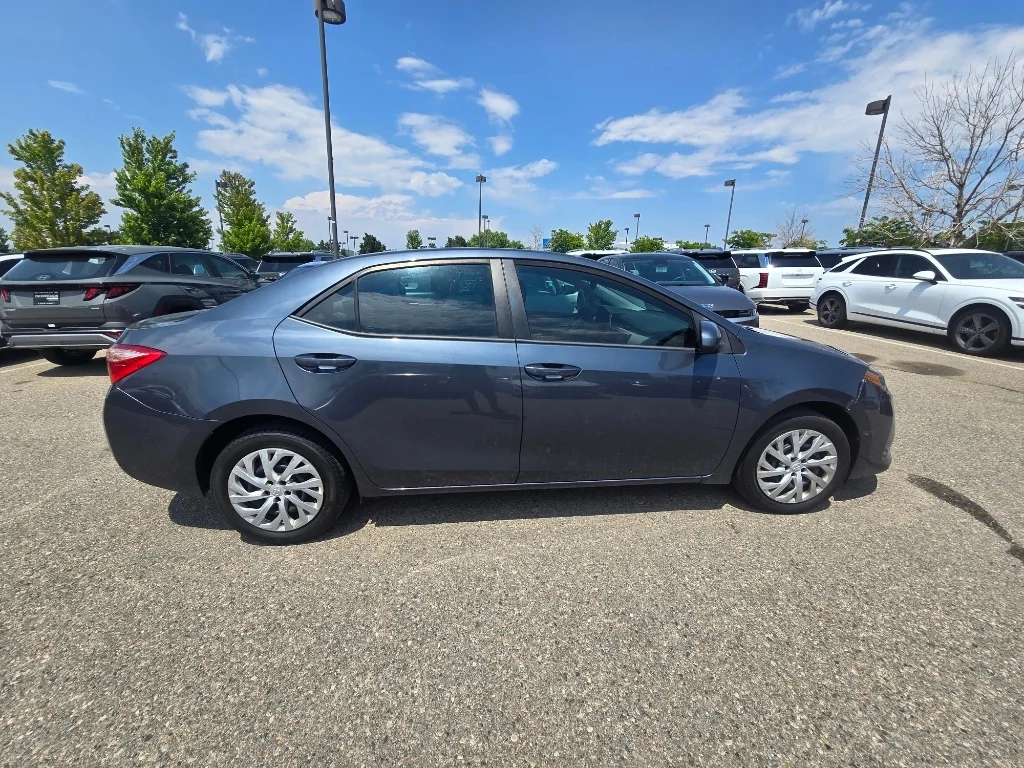Used 2019 Slate Metallic Toyota LE image 6